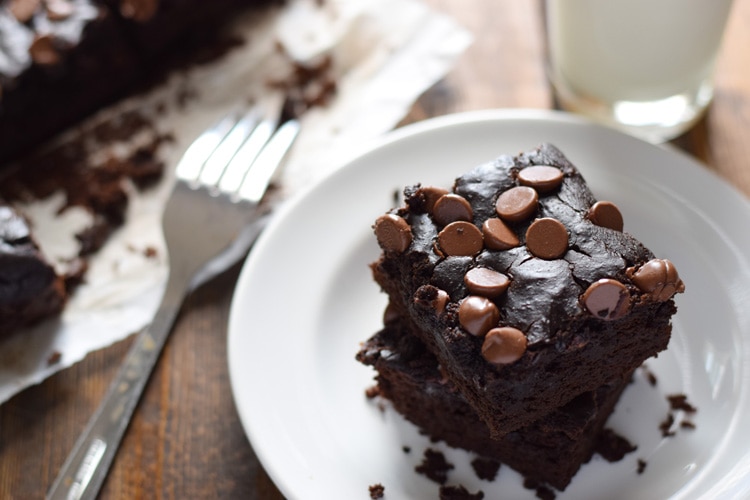 Black bean brownies with chocolate chips on a white plate