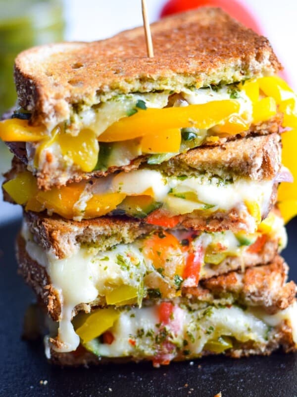 Made with sautéed vegetables, a cilantro parsley chimichurri spread and lots of melted cheese, this Mexican Fajita Grilled Cheese will leave you full and oh so happy. (vegetarian)