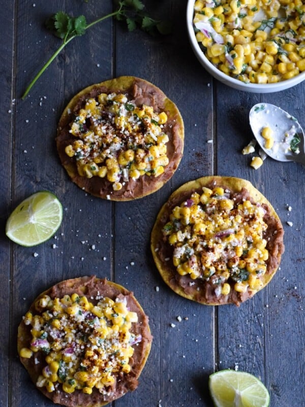 Ready in only 15 minutes, these Mexican Street Corn Tostadas made with canned corn, cotija cheese and chopped cilantro make for an easy lunch or quick dinner that's also gluten free and vegetarian.