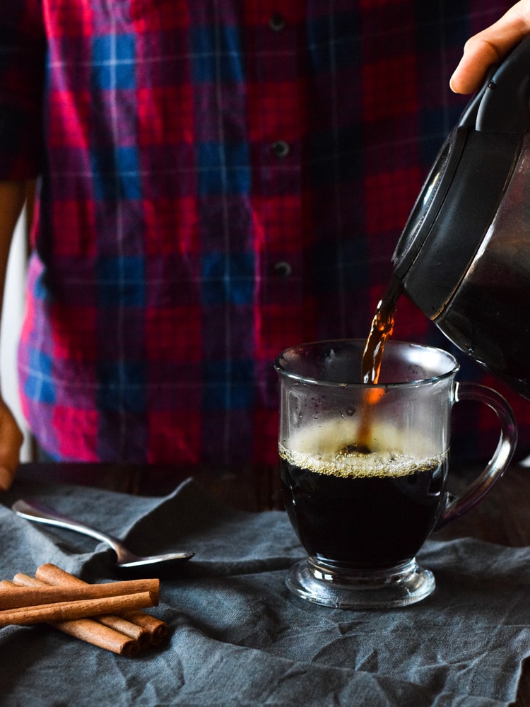 This Mexican Tres Leches Coffee topped with a mountain of whipped cream, cinnamon and chocolate shavings is easy to make at home and irresistibly yummy! Perfect for the holidays and the cold winter nights!