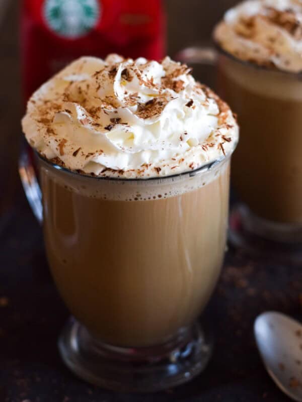 This Mexican Tres Leches Coffee topped with a mountain of whipped cream, cinnamon and chocolate shavings is easy to make at home and irresistibly yummy! Perfect for the holidays and the cold winter nights!