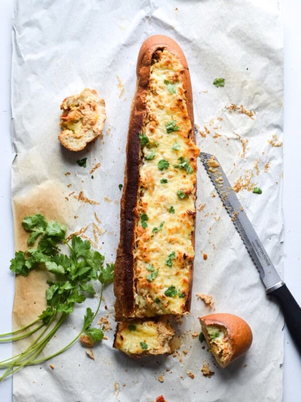 A crowd favorite, this Chicken Fajita Stuffed French Bread is a creamy, cheesy, and super flavorful appetizer that's perfect for parties and game day!