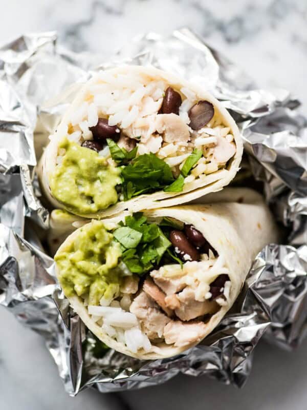 These Roasted Poblano Chicken Burritos are an easy Mexican lunch or dinner recipe that's perfect for weekend meal prep. They're also freezer friendly!