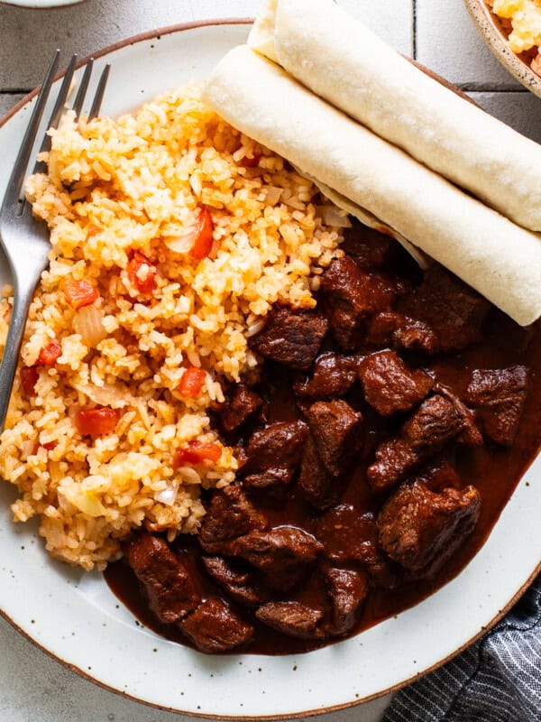 Chile colorado served the traditional and authentic way with Mexican rice on the side.