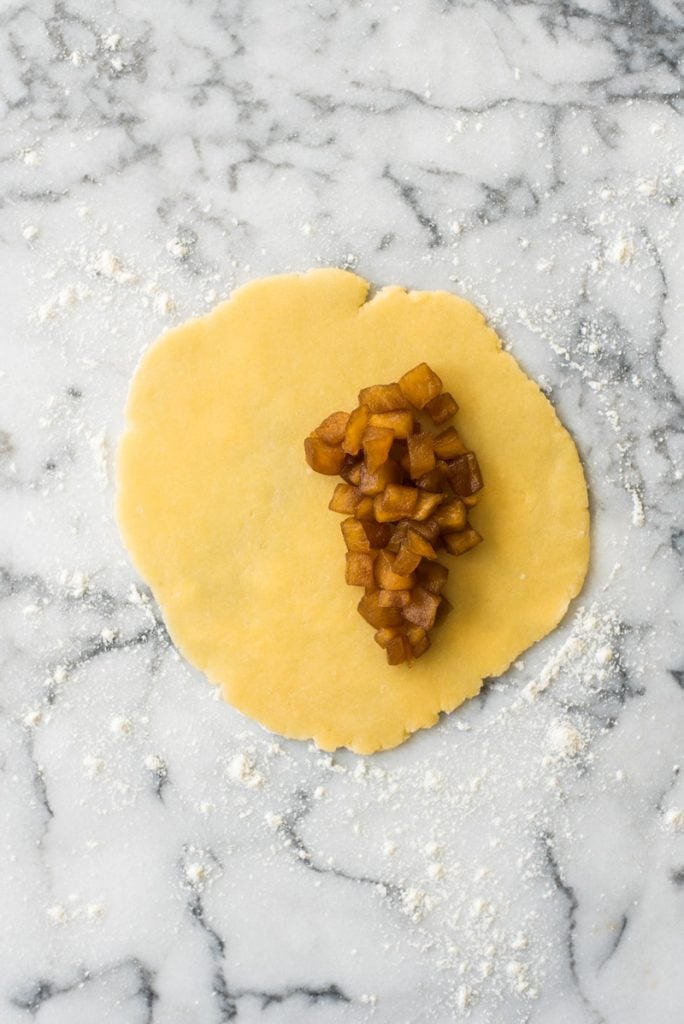 Baked Apple Empanadas are the perfect dessert for the fall and winter seasons! They're portable, delicious and super addicting.