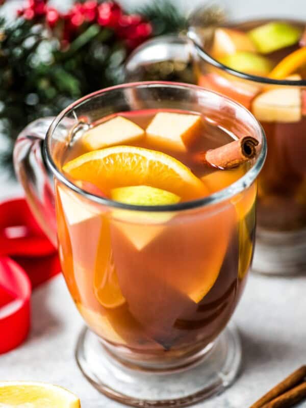 Mexican Ponche is a warm and comforting fruit punch made with apples, pears, oranges and guavas and spiced with cinnamon, cloves, tamarind and hibiscus typically served at Christmas time.