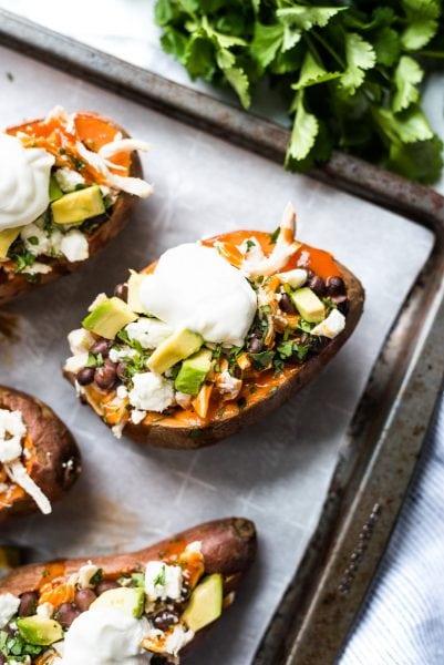 Chicken Enchilada Stuffed Sweet Potatoes - Isabel Eats