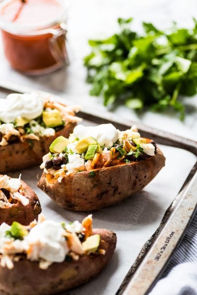 Chicken Enchilada Stuffed Sweet Potatoes - Isabel Eats