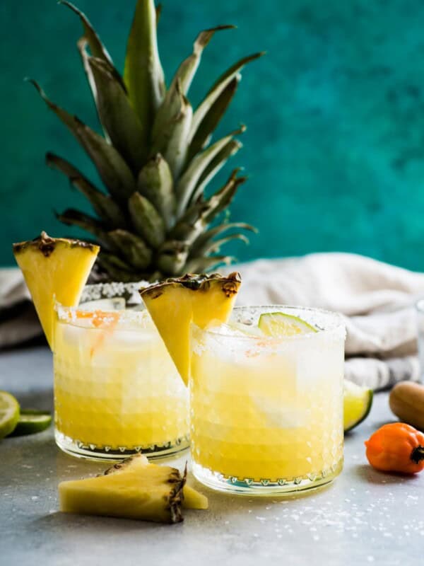 This pineapple margarita is made with sweet pineapple juice and a fresh habanero pepper for a spicy twist on a refreshing cocktail!