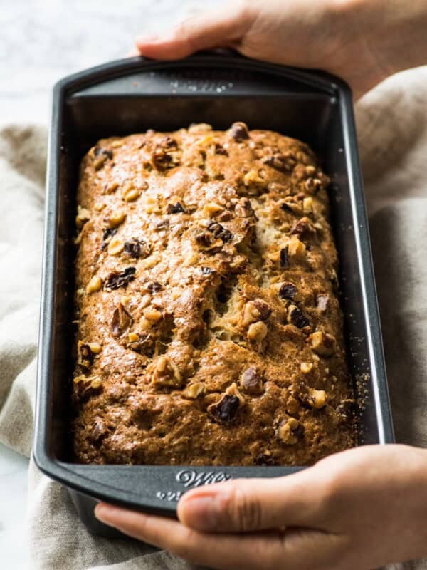 This Cinnamon Banana Nut Bread recipe is easy to make and creates a moist and delicious loaf that's perfect for breakfast or dessert.