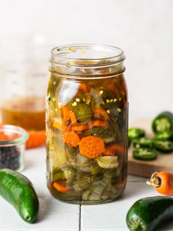 Pickled jalapenos in a jar ready to eat.