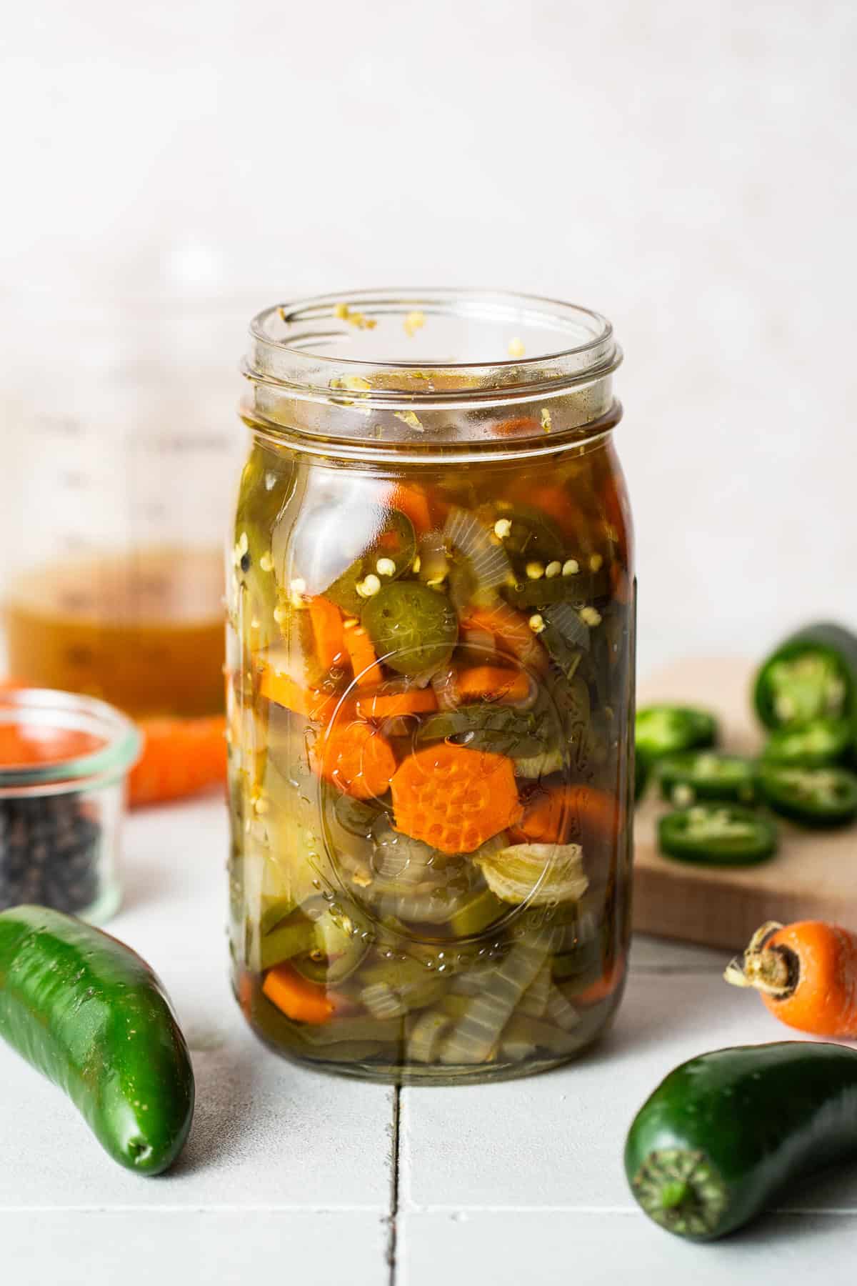 Pickled jalapenos in a jar ready to eat.