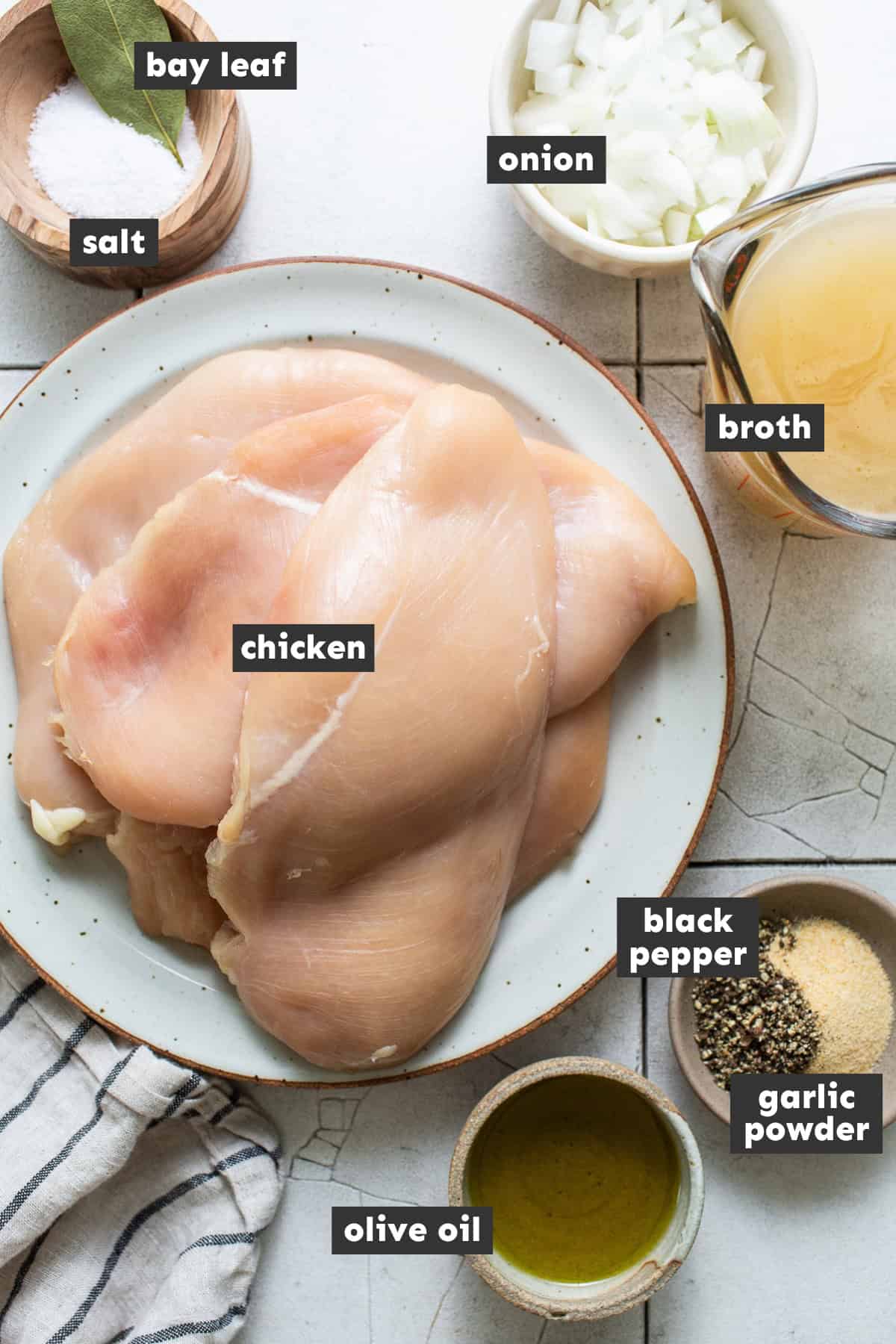 Ingredients for homemade shredded chicken on a table.