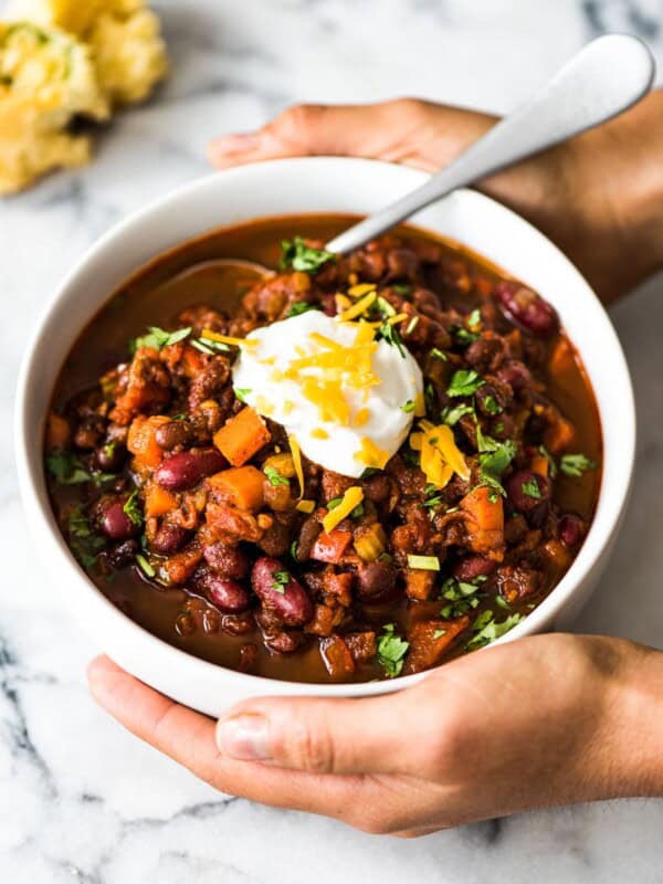 This Spicy Vegetarian Chili is thick, satisfying and super filling! Serve it with your favorite toppings for an easy and healthy meatless meal. (gluten free, vegetarian, vegan)