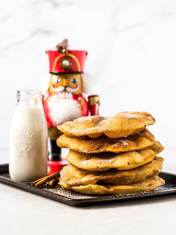 Often served during the Christmas and New Years holidays, this Mexican Bunuelos recipe makes the perfect fried dough covered in cinnamon sugar!