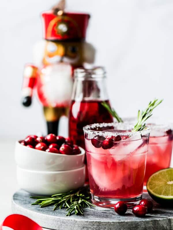 Filled with holiday cheer, this Cranberry Margarita is the perfect Christmas and New Years drink! Made with only 4 simple ingredients, it’s easy to make and comes together in only 5 minutes.