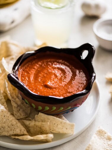 Chile de arbol salsa in an ornate Mexican-style brown bowl.