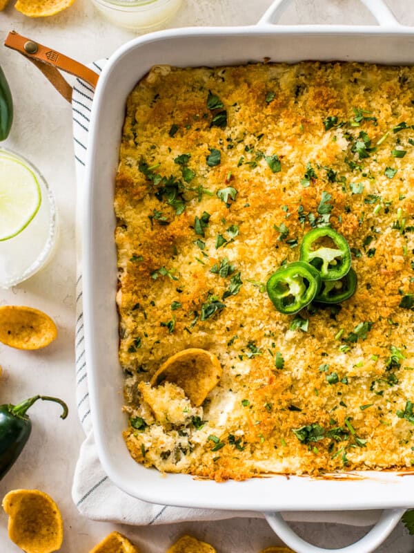 Jalapeno popper dip topped with crispy golden panko breadcrumbs and served with chips.