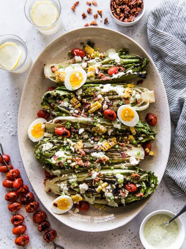 Grilled Romaine Salad on a large platter with jalapeno ranch dressing.