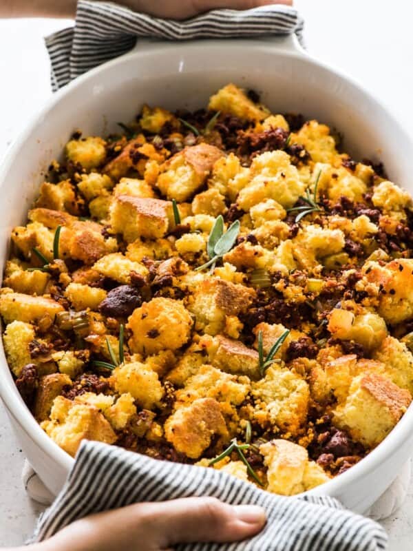 Cornbread stuffing topped with chorizo and fresh herbs.