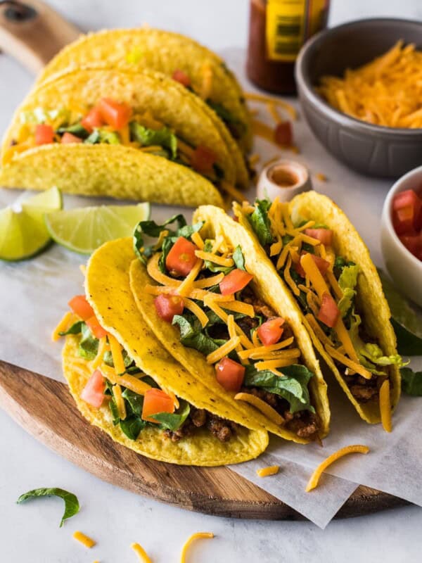 Hard shell tacos filled with ground beef and cheese.