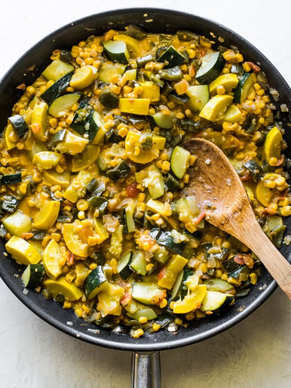 Cooked calabacitas in a large skillet.