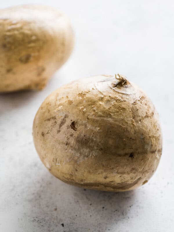 A jicama on a table.