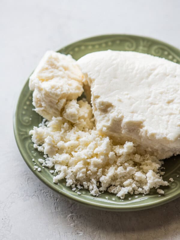 Crumbled queso fresco on a plate.