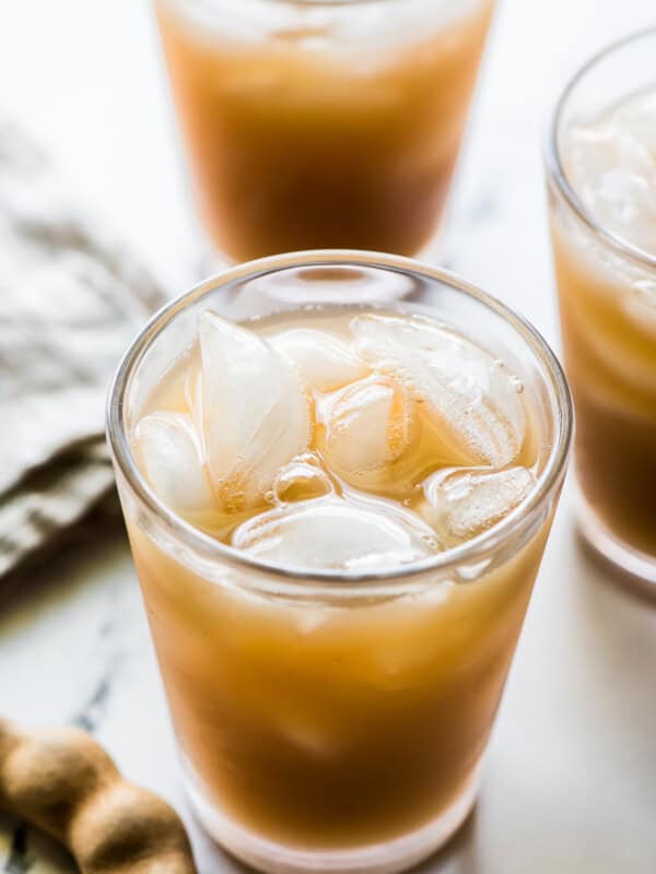 Agua de Tamarindo drink in a glass with ice.