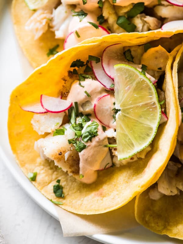 Tilapia fish tacos on a plate.