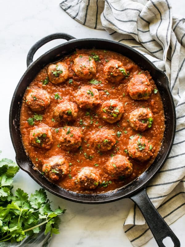 Mexican meatballs made from pork in a cast iron skillet.