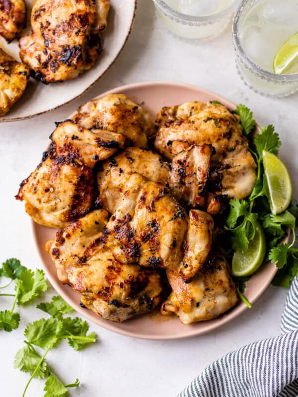 Lime chicken marinated thighs on a plate ready to eat.