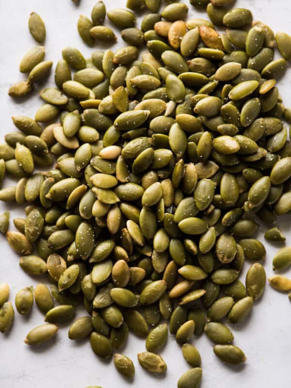 Pepitas (roasted pumpkin seeds) on a table.