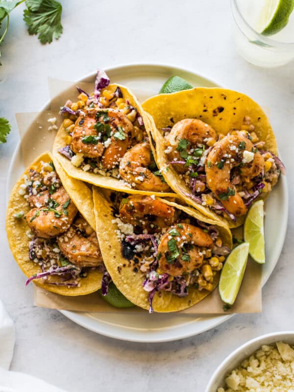 Spicy shrimp seasoned with chipotle chili powder in corn tortillas.