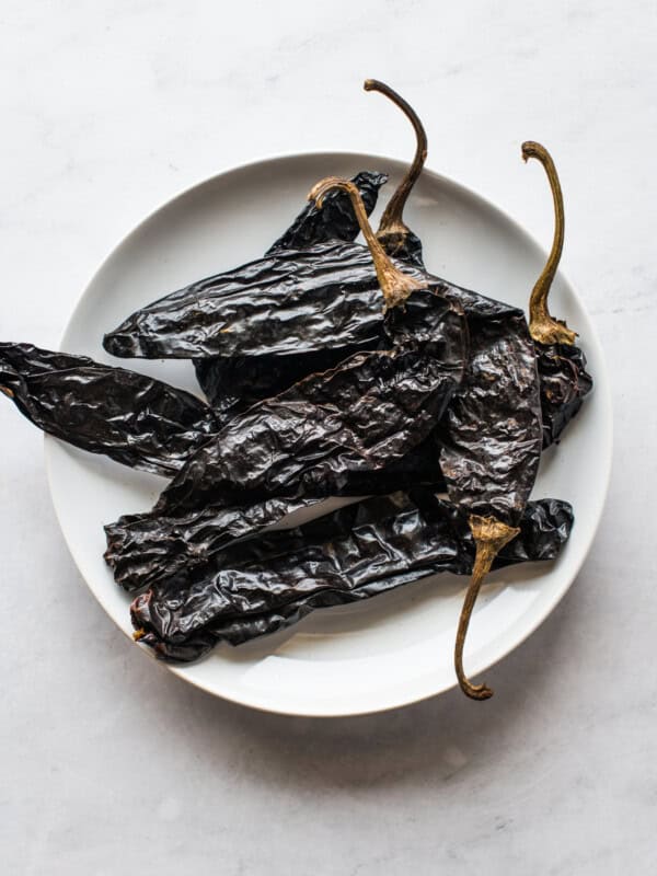 Pasilla peppers (chile pasilla) on a white plate