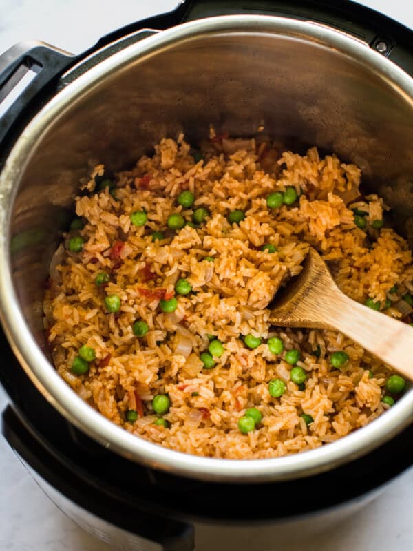 Instant Pot Mexican Rice with peas in the pressure cooker.