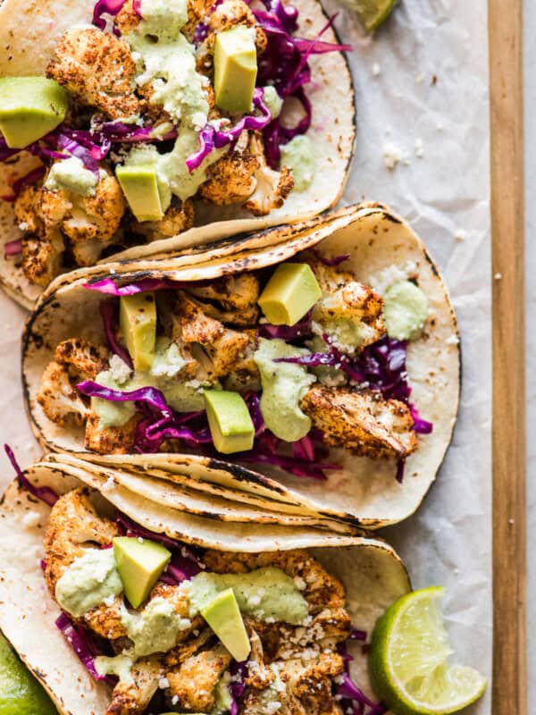 Cauliflower Tacos topped with a cilantro lime cashew crema.