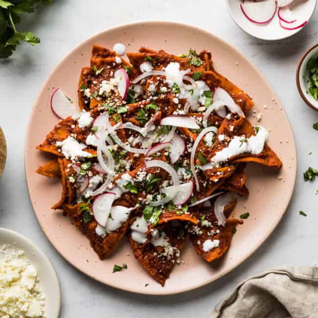 https://www.isabeleats.com/wp-content/uploads/2023/03/chilaquiles-rojos-small-11-650x650.jpg