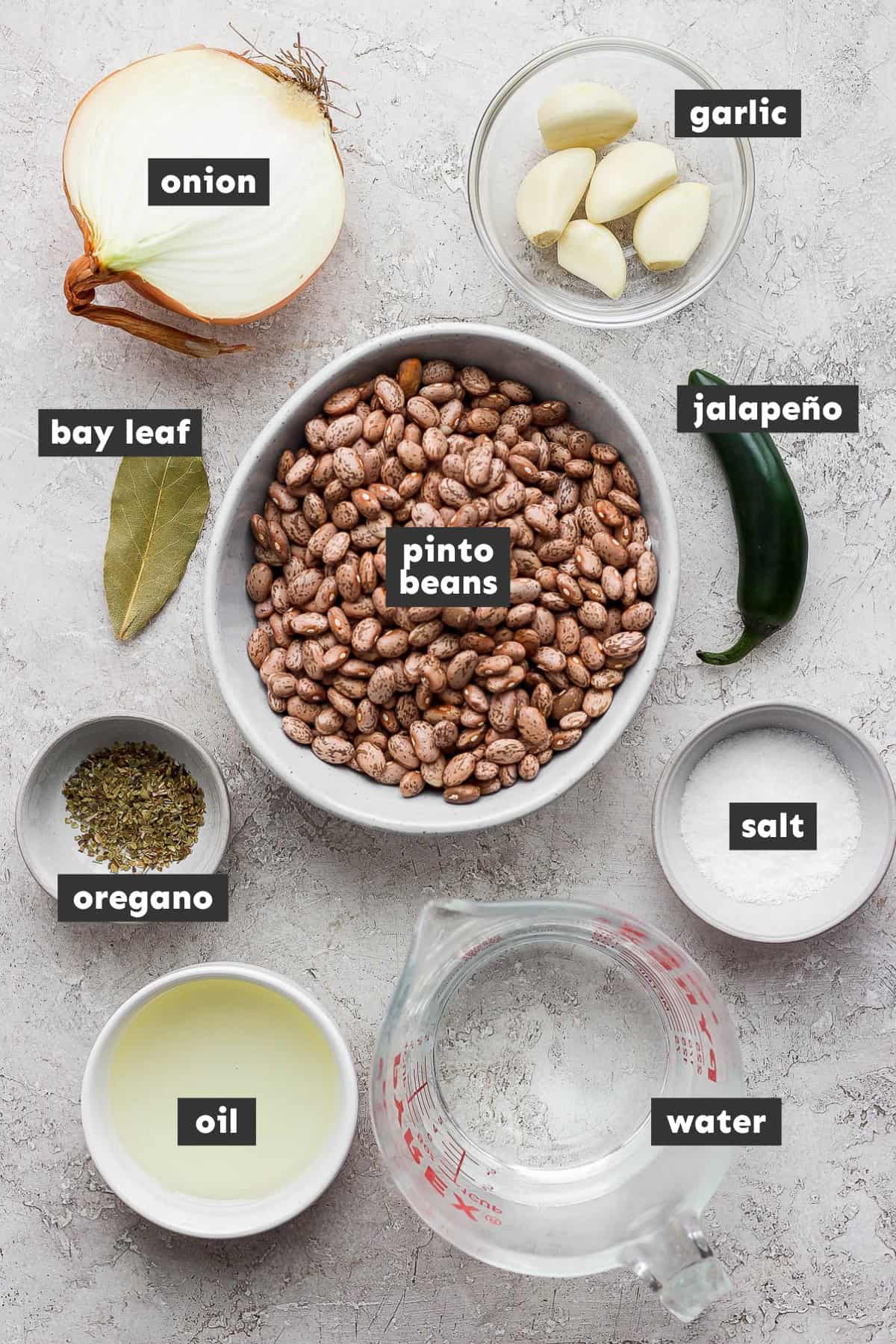 Ingredients in refried beans on a table.