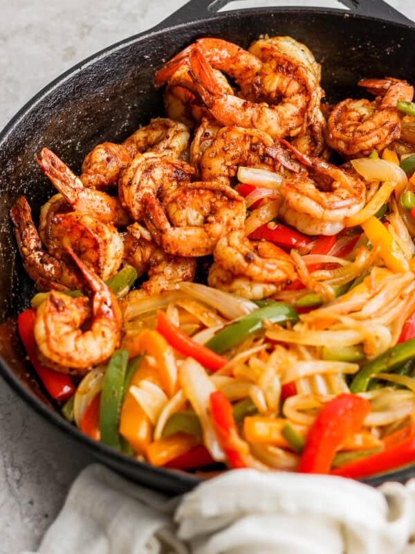 Shrimp Fajitas in a cast-iron skillet ready to be served.