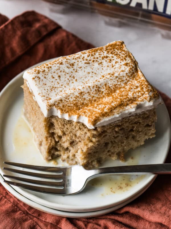 Apple Tres Leches cake on a plate.