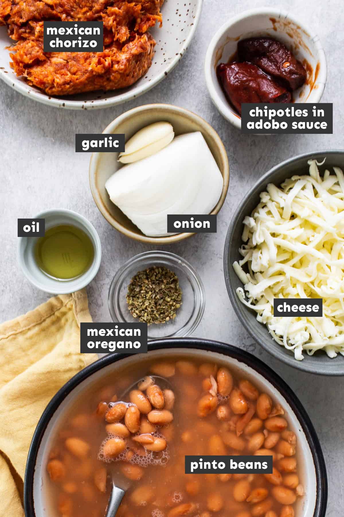 Ingredients for frijoles puercos on a table.