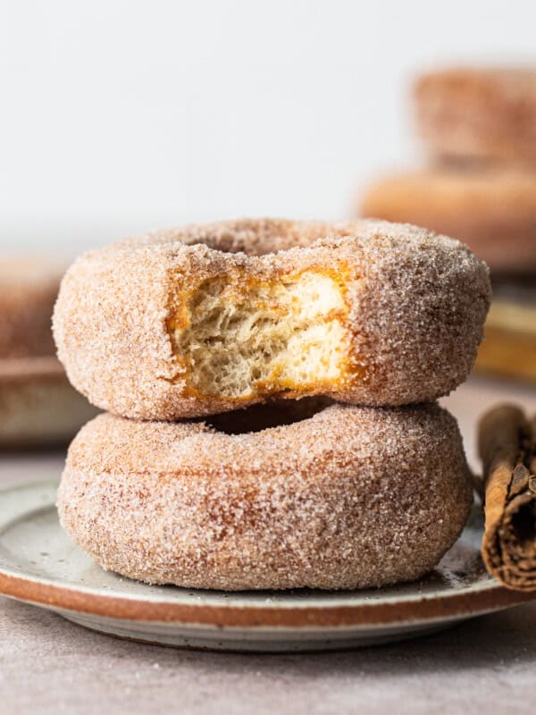 Mexican donuts (donas) stacked on top of one another.