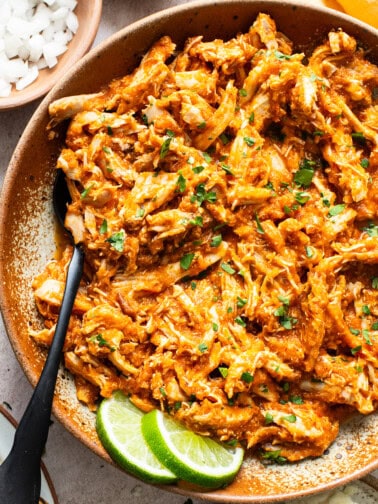 Chicken tinga topped with chopped cilantro.