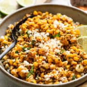 Esquites (Mexican street corn salad or Elote en Vaso) in a bowl.