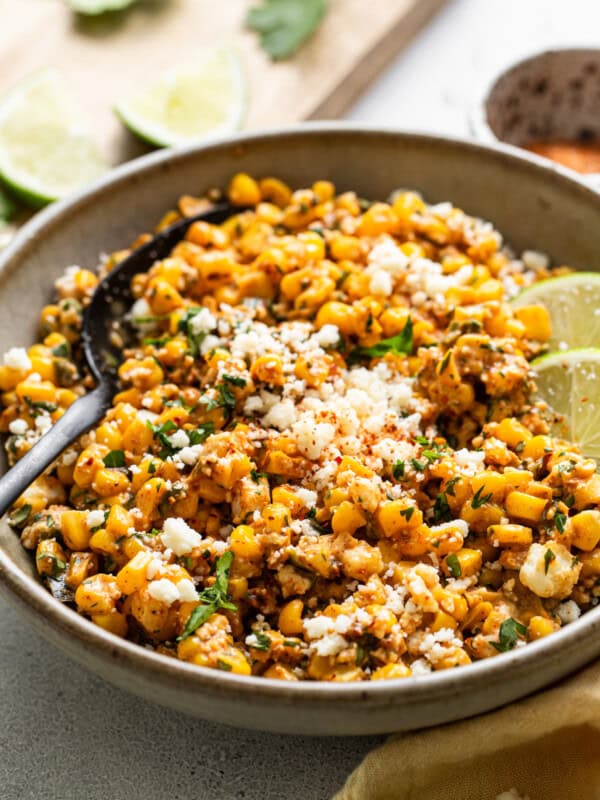 Esquites (Mexican street corn salad or Elote en Vaso) in a bowl.