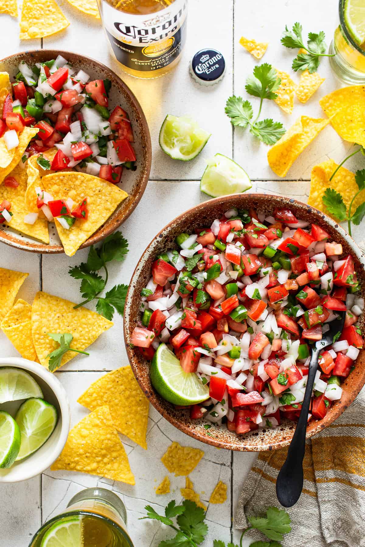 Pico de gallo served with tortilla chips and limes