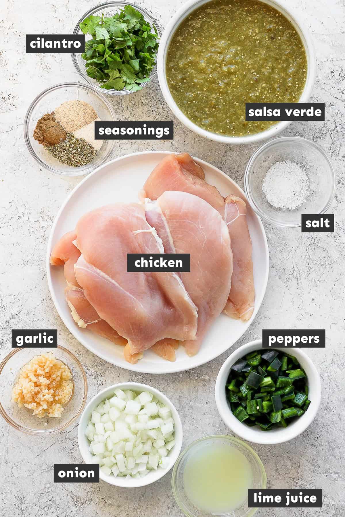 Salsa verde chicken ingredients separated and measured into mixing bowls 