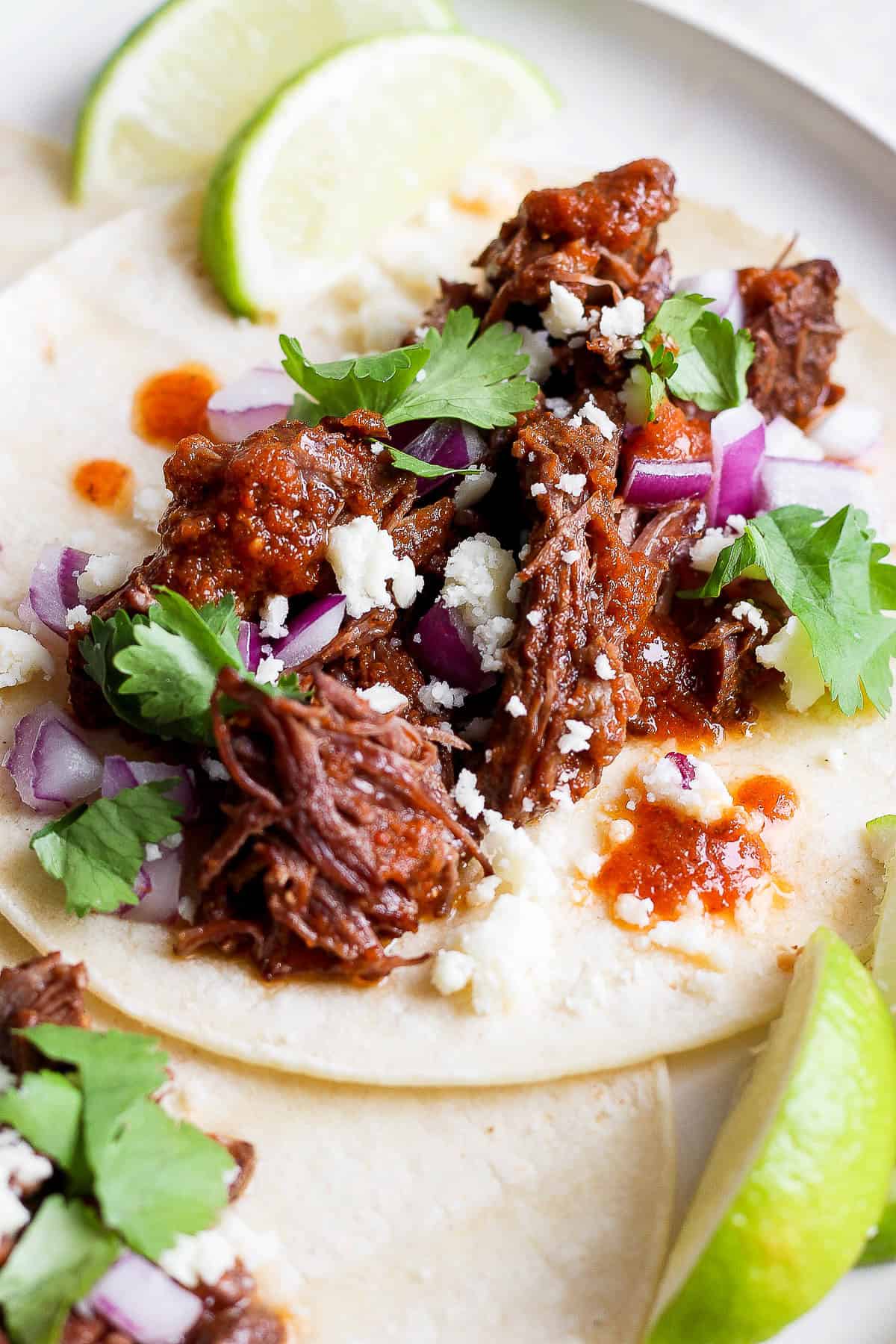 Beef tinga served in a taco ready to eat