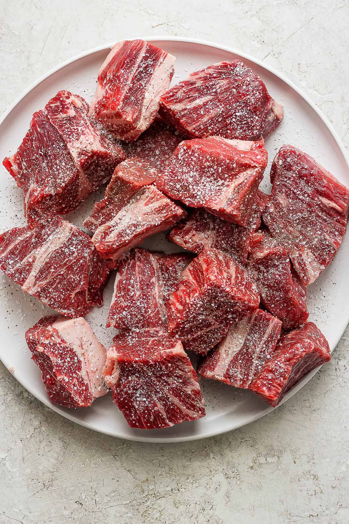 Seasoned raw beef on both sides